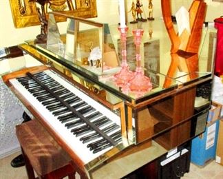 Custom decorated totally mirrored piano. Legs, sides, top, key cover all with mirrors. All the keys work too except only one sticks a bit.