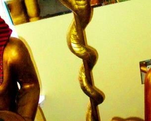 Set of brass Egyptian Cobra God candle holders