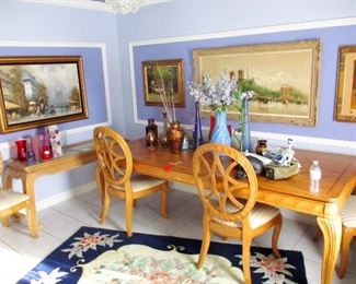 Fabulos Maple dinning set with six matching chairs and side board. Immaculate condition. Center piece collapses to make shorter..