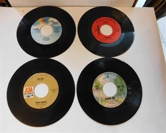 Four 45RPM Records
