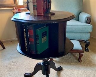 Revolving library table in two parts, some damage.