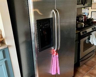 G.E. Stainless Refrigerator with ice maker on door, $399.00, buyer must disconnect and move after sale