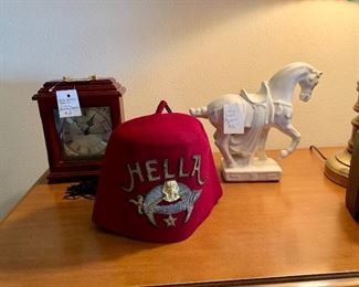 "Hella" fez, carriage clock and blanchin prancing horse