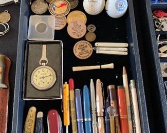vintage fountain pens, golf balls, wooden nickels, confederate coin