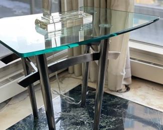 Modern glass and chrome side table. Measures 26" W x 20" D x 30" H. Photo 1 of 2.