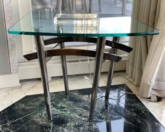 Modern glass and chrome side table. Measures 26" W x 20" D x 30" H. Photo 2 of 2.