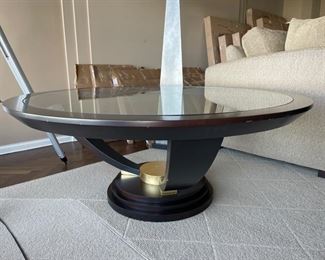 Art Deco style glass top cocktail table. Measures 36" D. Photo 1 of 2.