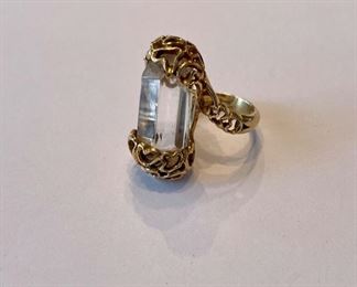 Gold and crystal ring.