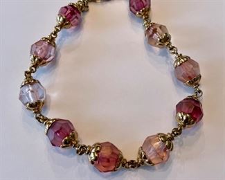 "Amethyst" and gold necklace.