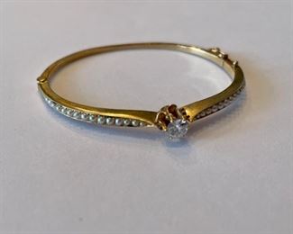 Gold bracelet with diamond and pearl accents. Photo 1 of 2.
