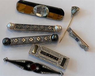 Vintage Art Deco style pins.