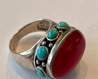Sterling silver ring with coral and turquoise accents.
