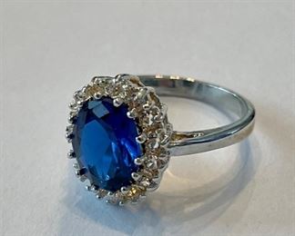Sapphire ring with diamond accents.