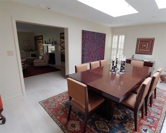 Hugues Chevalier "Tamara" dining room table with self-storing leaf. Table measures 98" to 126" L x 48" W x 31" H. 28" clearance. Photo 1 of 3.