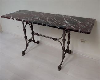 Console with marble top and iron base. Measures 58" W x 20" D x 29.5" H. Photo 1 of 4.