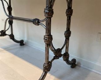 Console with marble top and iron base. Measures 58" W x 20" D x 29.5" H. Photo 3 of 4.