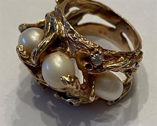 Vintage cocktail ring with pearl accents.