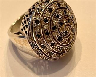 Vintage cocktail ring with sapphire and diamond accents.