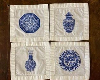 Set of 8 cotton embroidered cocktail napkins. Two of each pattern.