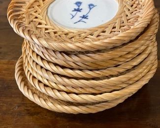 Set of 8 woven grass coasters with porcelain base.