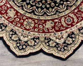 Persian area rug. Measures 5’ D. Photo 2 of 3.