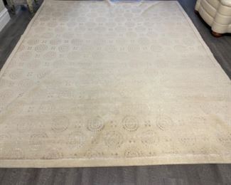 Neutral silk area rug. Measures 8’ x 10’. Photo 2 of 3.