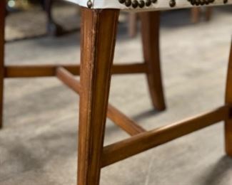Set of 8 Chippendale style dining chairs upholstered in white leather with nail head trim. Measures 20” Seat H: 19.” Photo 3 of 3.