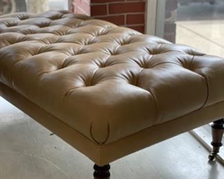Caramel colored leather ottoman. Measures 50” x 16.5”. Photo 1 of 2.