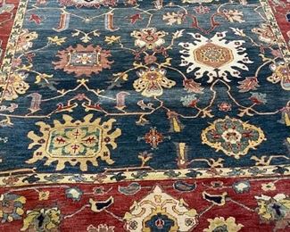 Persian Area Rug Measures 11' 8’ x 8'.