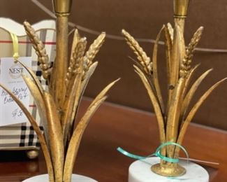 Pair of gilt sheaf of wheat candlesticks.