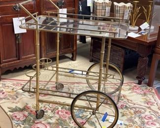 Vintage Italian faux bamboo silver over brass bar cart. Photo 1 of 3.