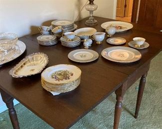 Drop leaf table with vintage California china