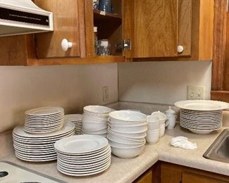 Twelve piece place setting with many serving pieces.  Mikado brand.