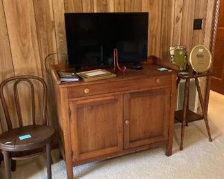 Wash stand with storage and one of several bentwood chairs 