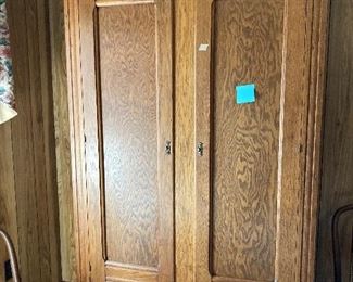 Large oak armoire with drawers and hanging rod