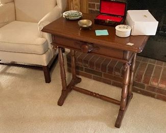 Side table with stretcher and drawer