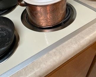 Stoneware casserole in pierced tin holder