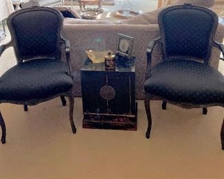 Pair of black Bergere chairs