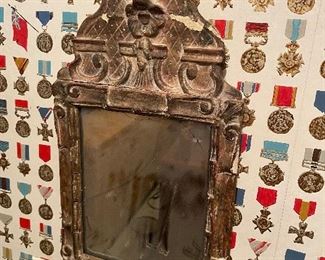 Ornately framed mirror