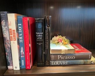 Sample of Art coffee table books include Picasso and the Louvre.