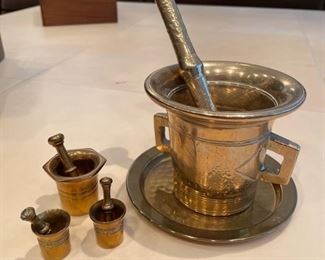 Brass mortar and pestle with under plate.