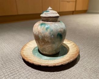 Glazed ceramic lidded jar with under plate. Signed by artist. Photo 1 of 4.