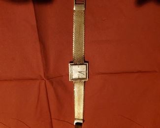 Omega Ladies' watch D 6650, circa 1960s. 14 K gold snap in watch and 14K gold band (solid).  Runs. 