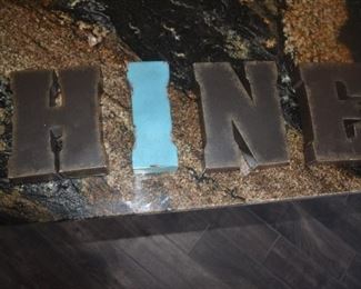 metal letters that spell shine