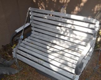 DARLING TWO SEATER SWING WITH CHAINS TO HANG. LOCATED IN AHWATUKEE CAN BE PURCHASED NOW.  $45.00