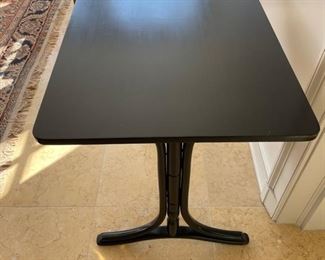 Ebony side table. Measures 33" W x 23" D x 27.5" H. Photo 1 of 3.