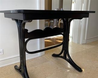 Ebony side table. Measures 33" W x 23" D x 27.5" H. Photo 3 of 3.