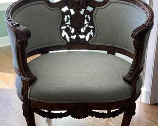 Original French walnut finest quality tub chair from a salon suite circa 1880 in Louis Napoleon style. Figurative carved medallion at center. Newer upholstery. Measures 32.24" x 24" D x 34" H; Seat Height 34". Photo 1 of 5.