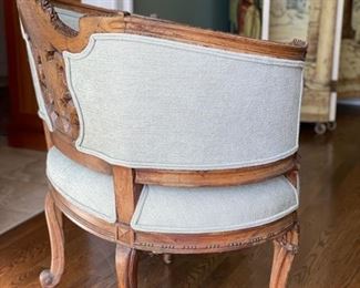 Original French walnut finest quality tub chair from a salon suite circa 1880 in Louis Napoleon style. Figurative carved medallion at center. Newer upholstery. Measures 32.24" x 24" D x 34" H; Seat Height 34". Photo 4 of 5.
