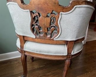 Original French walnut finest quality tub chair from a salon suite circa 1880 in Louis Napoleon style. Figurative carved medallion at center. Newer upholstery. Measures 32.24" x 24" D x 34" H; Seat Height 34". Photo 5 of 5.